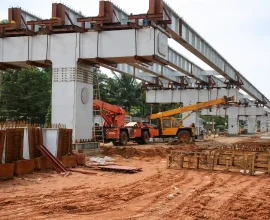 Elevated construction with cranes and girders